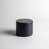 Lavender candle in a black minimalist tin, featuring pure French lavender with a soft, powdery aroma, woody balsamic heart notes, and herbaceous top notes. No synthetics, just the real thing. Made with coconut/soy wax, essential oils, and botanical extracts.