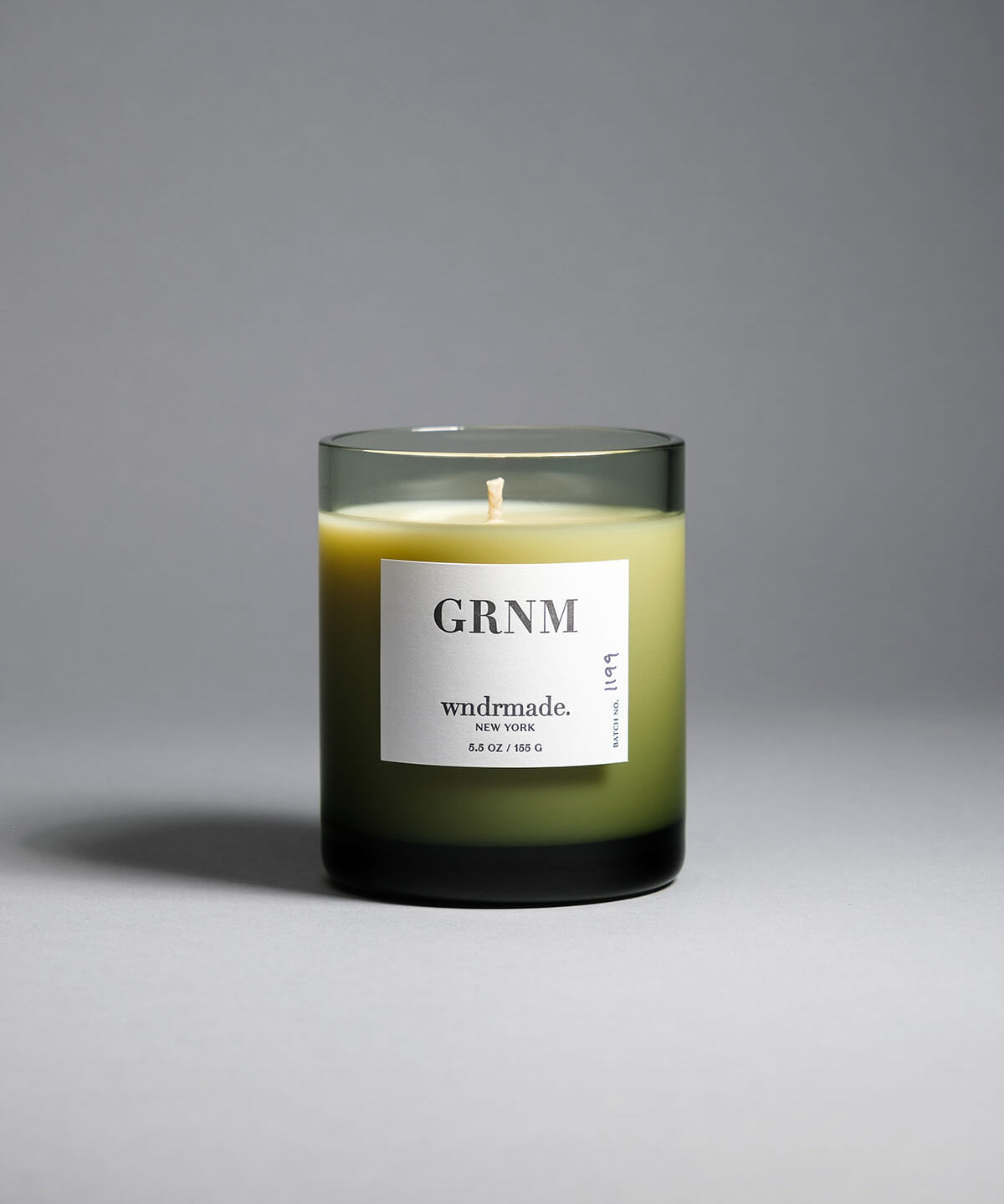 Geranium candle in a smoky black glass, offering a fresh floral geranium aroma with calming vibes and natural insect-repelling properties. Perfect for summer nights, a beach house, or a cabin in the woods. Made with coconut/soy wax, essential oils, and botanical extracts.