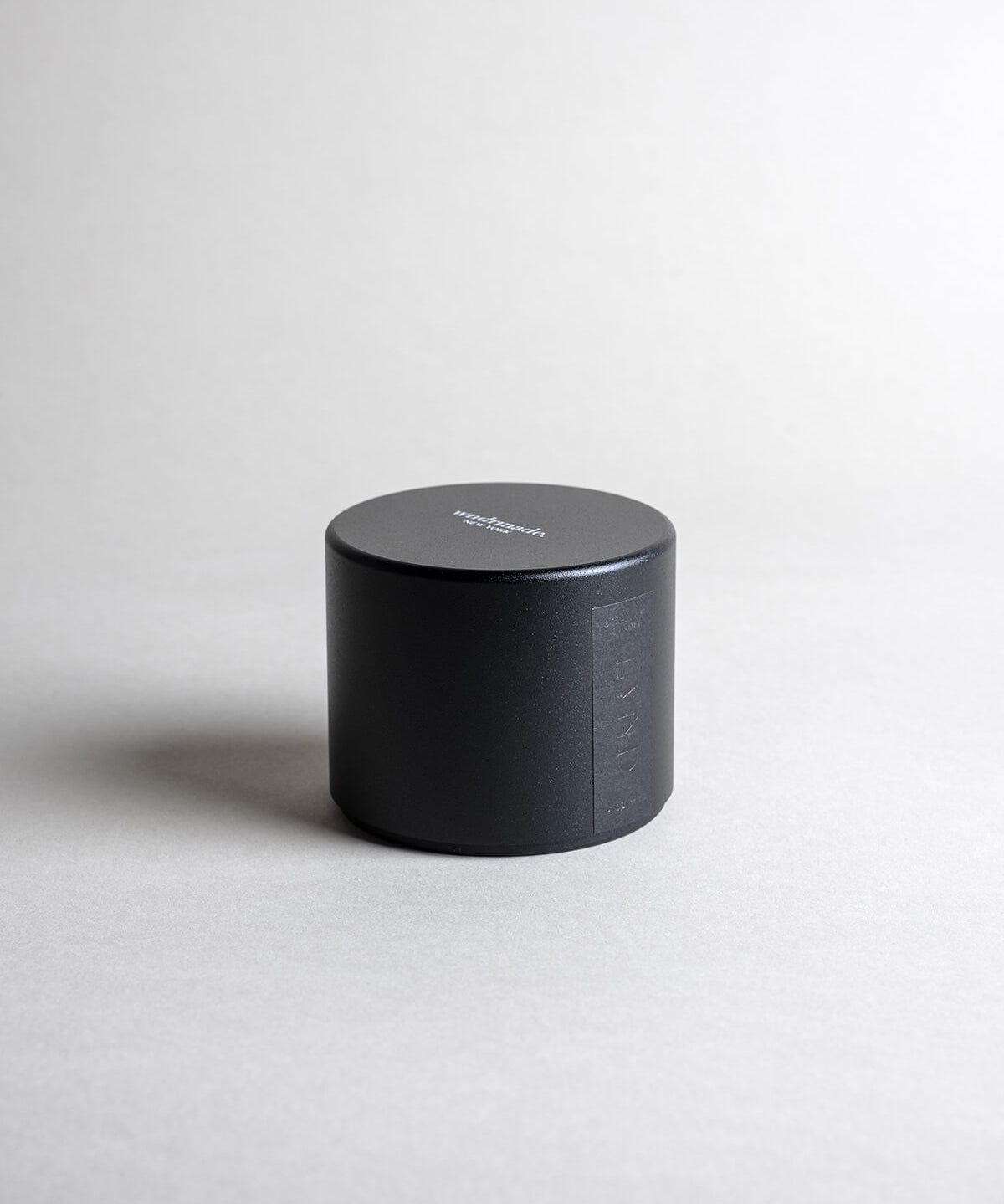 Lavender candle in a black minimalist tin, featuring pure French lavender with a soft, powdery aroma, woody balsamic heart notes, and herbaceous top notes. No synthetics, just the real thing. Made with coconut/soy wax, essential oils, and botanical extracts.